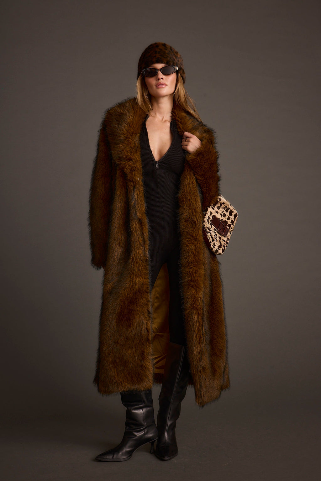 Alternate angle of the brown jacket highlighting the overall design.