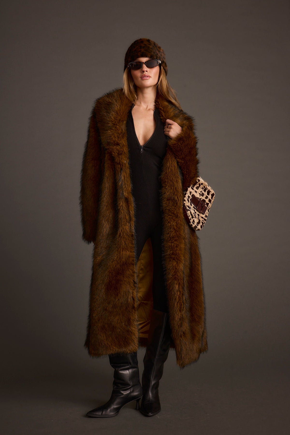 Alternate angle of the brown jacket highlighting the overall design.
